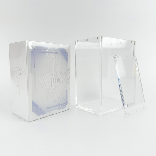Clear acrylic display case for Gundam Card Game Beta booster box with a magnetic top-opening lid and UV protection.