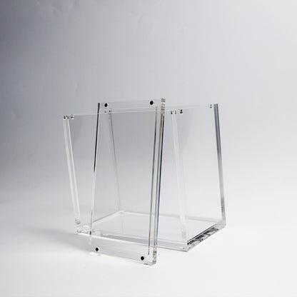 Clear acrylic display case for TCG booster boxes, featuring a 2-piece top-opening design with magnetic closure.