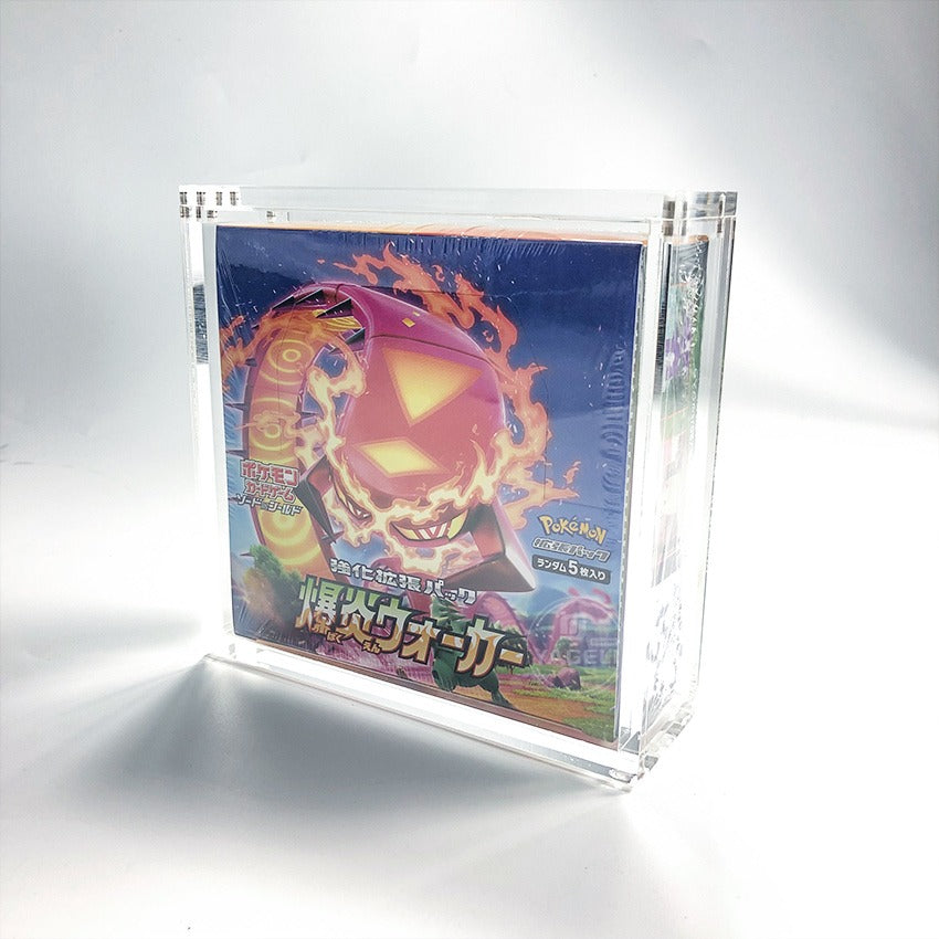 Clear acrylic display case protecting a colorful Pokémon booster box, featuring strong magnetic closure.