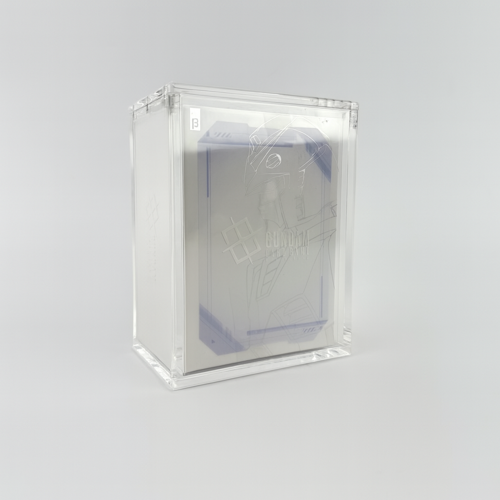 Clear UV-protected acrylic display case holding a Gundam Card Game Edition Beta booster box with magnetic closure.