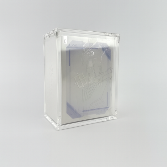 Clear UV-protected acrylic display case holding a Gundam Card Game Edition Beta booster box with magnetic closure.