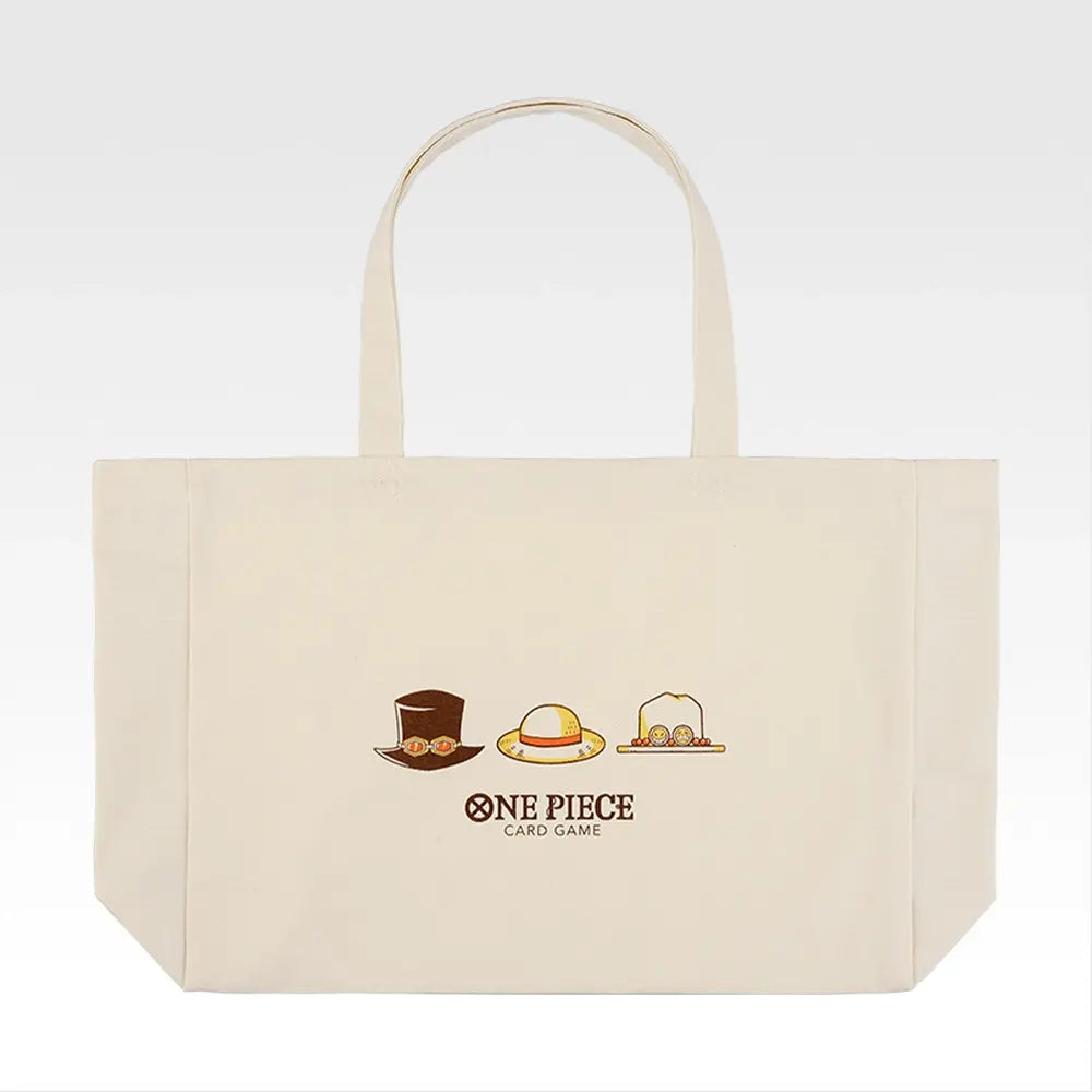 Off-white canvas One Piece Card Game tote bag featuring iconic character hat illustrations and a central logo.