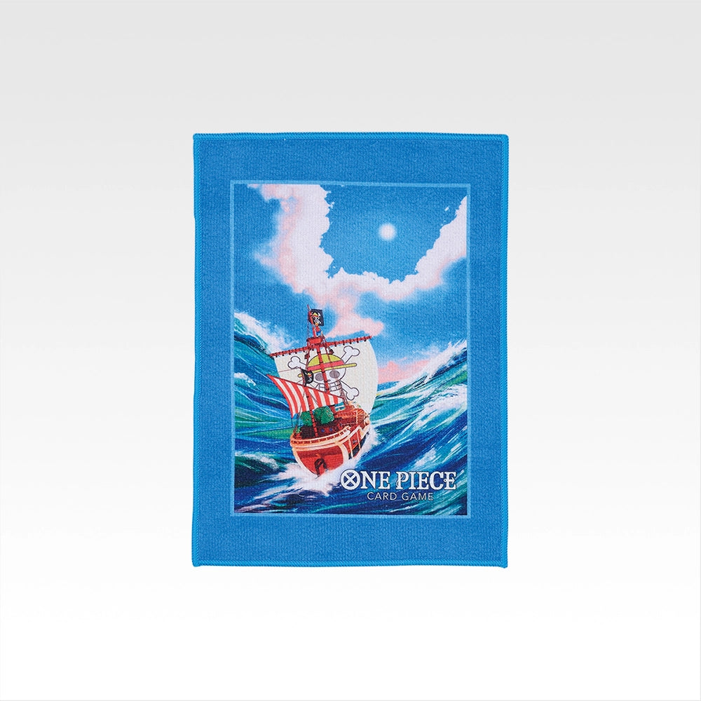 Blue One Piece Card Game towel featuring the Going Merry ship on ocean waves, measuring 29x20 cm with a soft fabric finish.