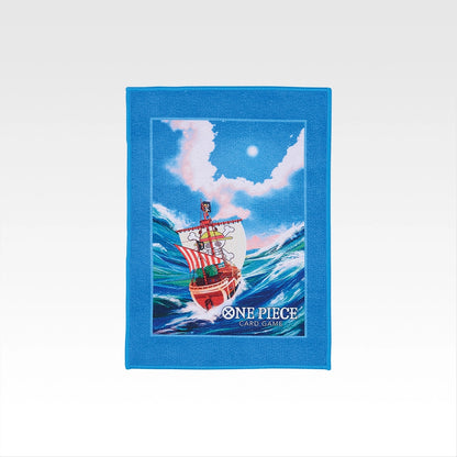 Blue One Piece Card Game towel featuring the Going Merry ship on ocean waves, measuring 29x20 cm with a soft fabric finish.