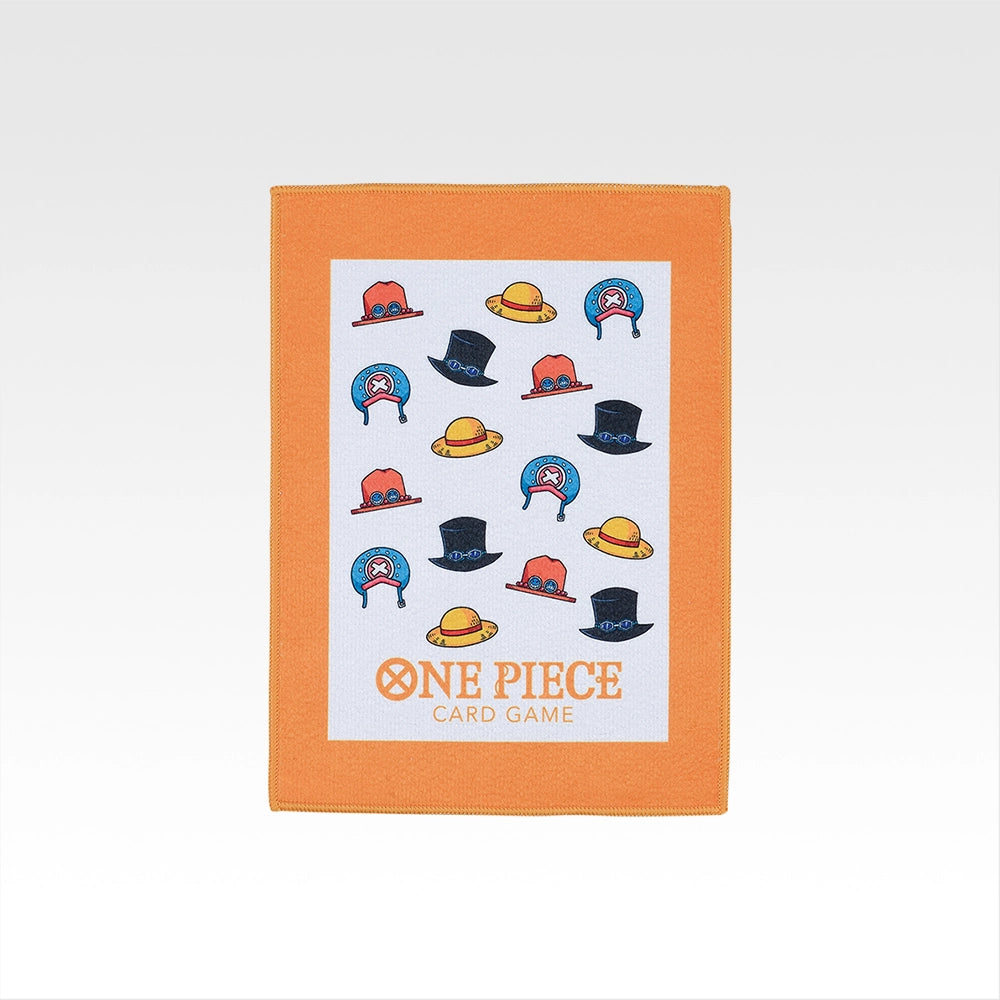 One Piece Card Game Prize F towel featuring a white center with colorful character hat icons and an orange border.
