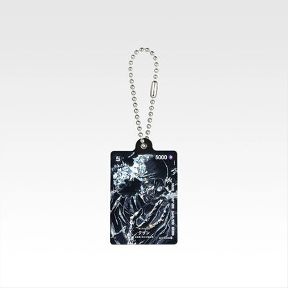One Piece Ichiban Kuji 5cm acrylic charm featuring a black and white Kuzan character card design with a silver ball chain.