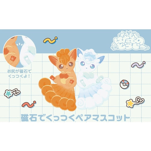 Orange Vulpix and white Alolan Vulpix plushies with magnetic backs that stick together, featuring ball chains for hanging.