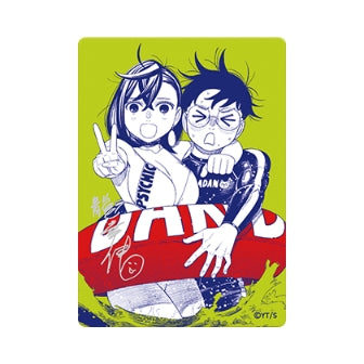 NatsuComi 2026 metallic foil card featuring blue line art of two anime characters on a bright lime green background.