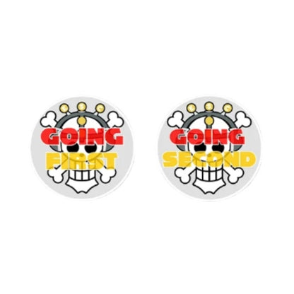 Two round acrylic One Piece Card Game tokens: "Going First" and "Going Second" with skull and crossbones design.