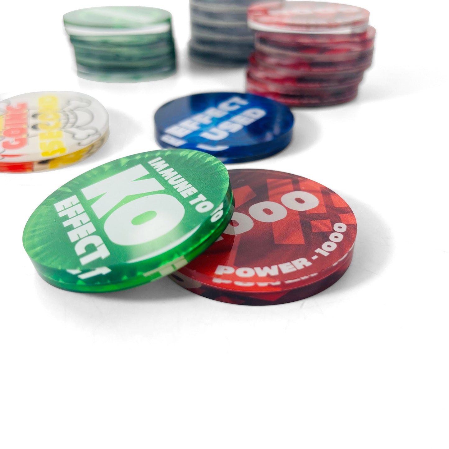 Colorful acrylic One Piece Card Game tokens: red Power, green KO Effect, blue Effect Used, and yellow Going First/Second.