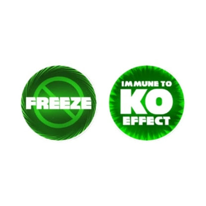 Two round green acrylic One Piece Card Game tokens: "FREEZE" with a stop sign, and "IMMUNE TO KO EFFECT.