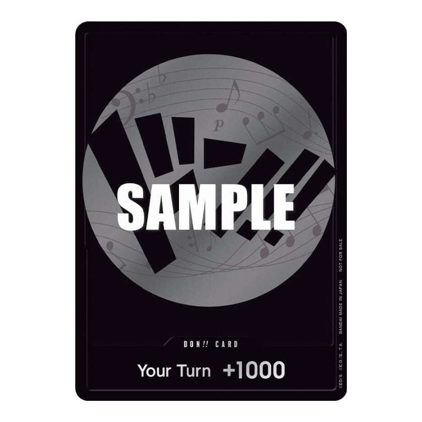 One Piece Strawhat Crew Don! card featuring a black design with a silver circular musical motif and +1000 power text.