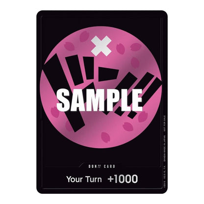 One Piece Strawhat Crew Don!! card featuring a pink circular design with cherry blossom petals on a black background.