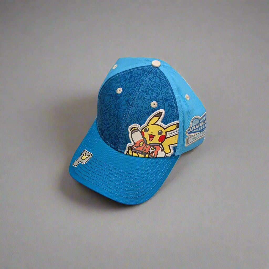 Blue Pokémon 2025 WCS baseball cap featuring a Pikachu patch, patterned panels, and Anaheim competitor embroidery.