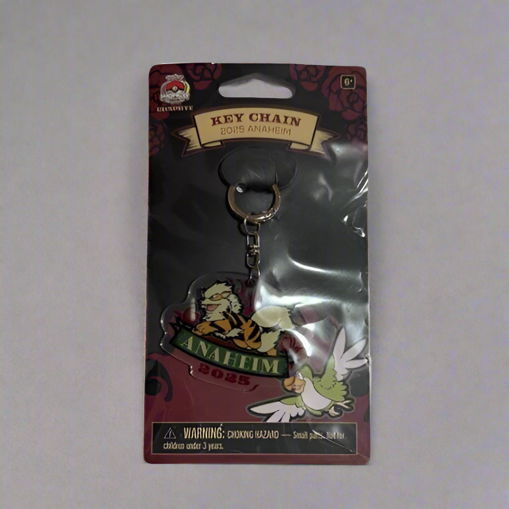 Arcanine acrylic keychain from the 2025 Pokémon World Championships in Anaheim, sealed in branded display packaging.