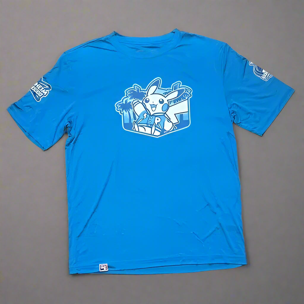 Bright blue Pokémon 2025 World Championships T-shirt featuring a white Pikachu graphic and Anaheim event branding.