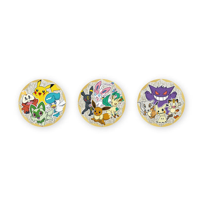 Three circular Pokémon Gem Pack badges featuring colorful character illustrations on a textured gold background.