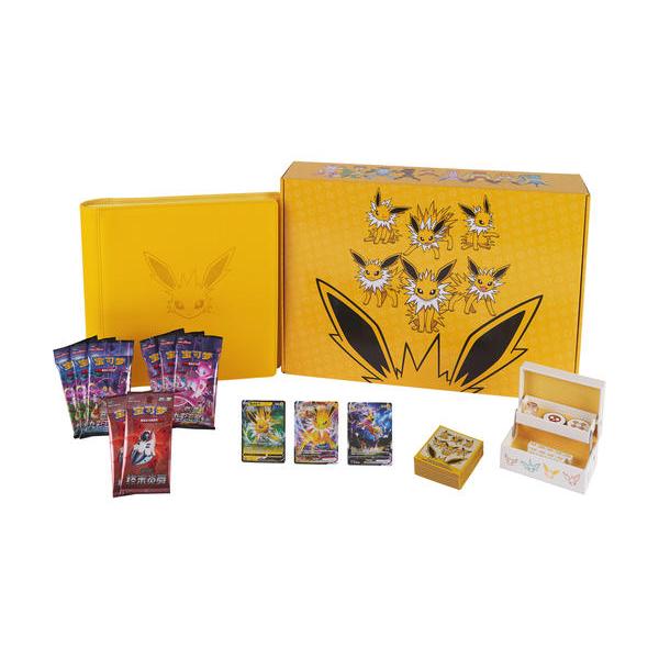 Yellow Pokémon Eeveelution Advanced Collection Box with cards, binders, and accessories.