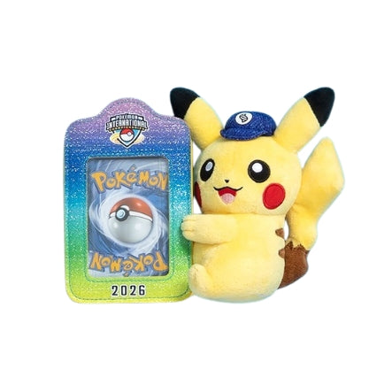 Pikachu plush wearing a blue cap next to a rainbow-gradient Pokémon card stand labeled 2026 for the NAIC tournament.