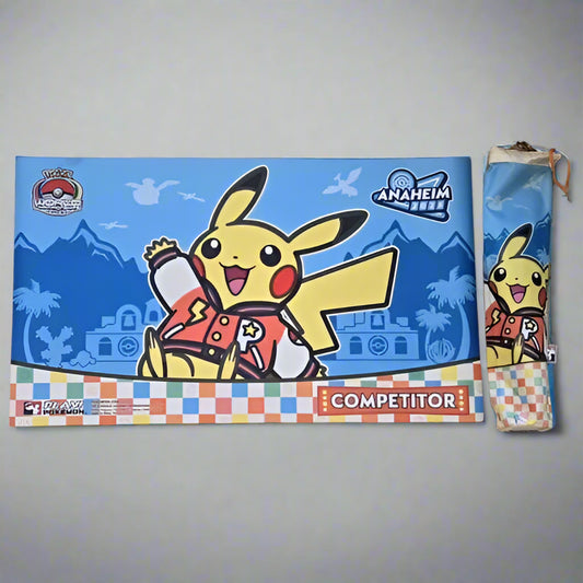 2025 WCS Anaheim rubber playmat featuring Pikachu in a varsity jacket, with a colorful checkered border and matching storage bag.