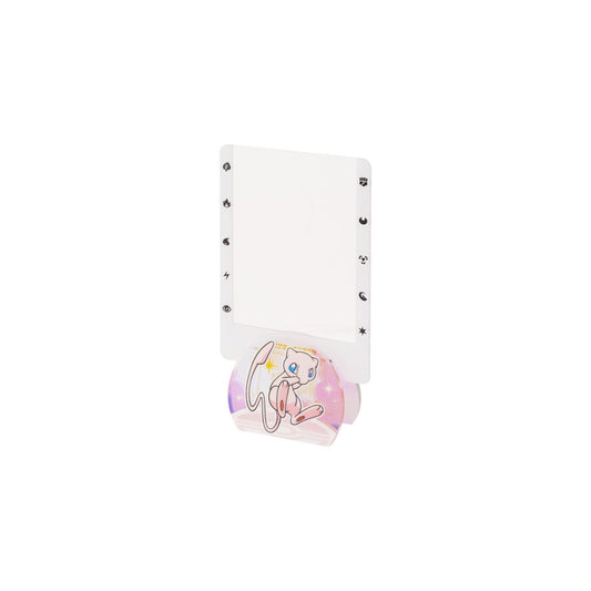 Pokémon 151 Journey acrylic stand featuring a pink Mew character design with energy symbols on a white rectangular frame.