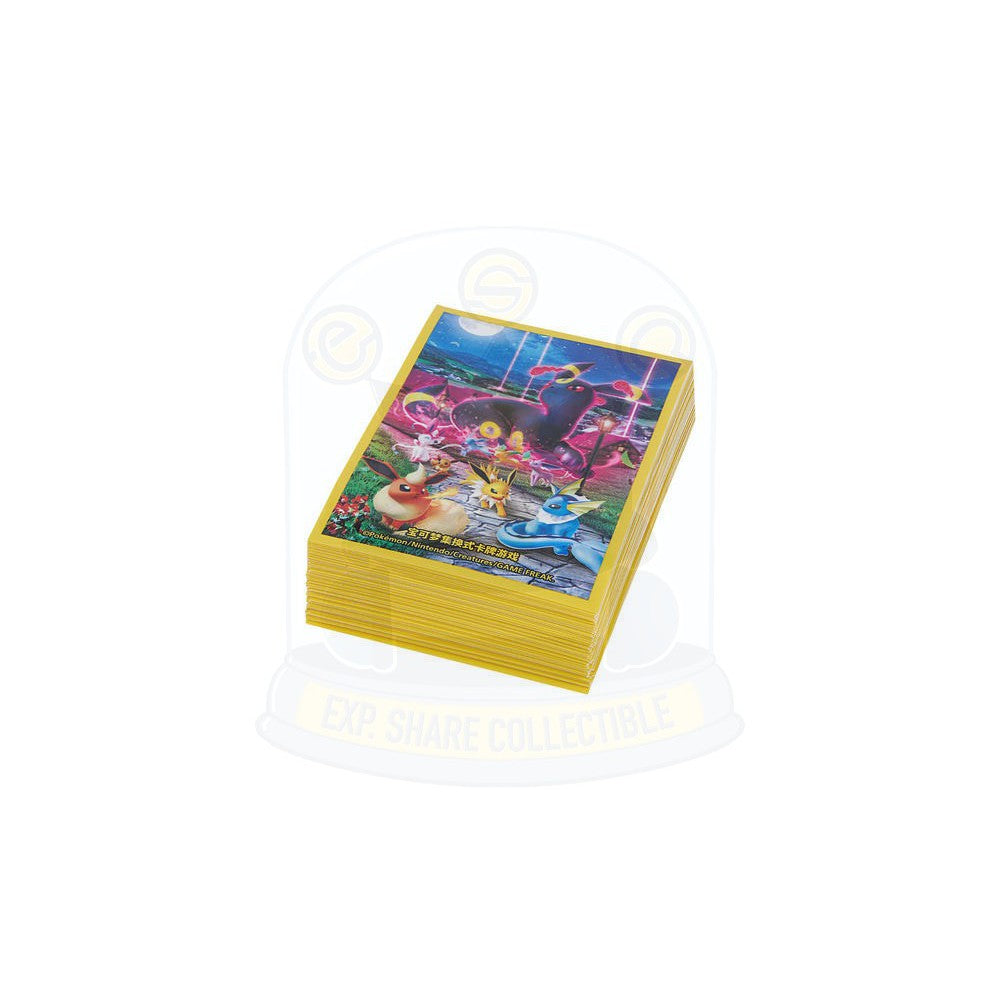 Stack of yellow Pokémon card sleeves featuring Eeveelution characters against a vibrant night sky.