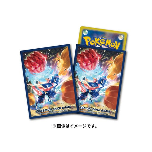 Two premium gloss Pokémon card sleeves featuring Fighting Terastal Greninja, with a blue-backed Pokémon card visible behind.