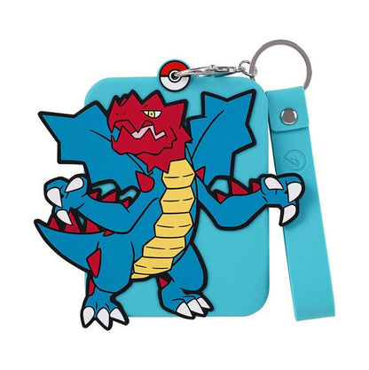 Blue silicone Pokémon display with a red and blue Feraligatr character, featuring a Poké Ball keychain clip and wrist strap.