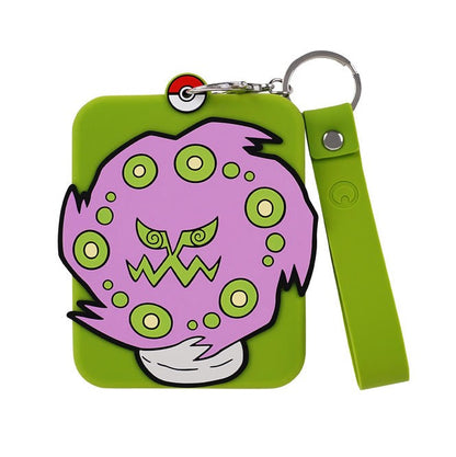 Green silicone Pokémon display with a purple Spiritomb design, attached to a keychain and wrist strap.