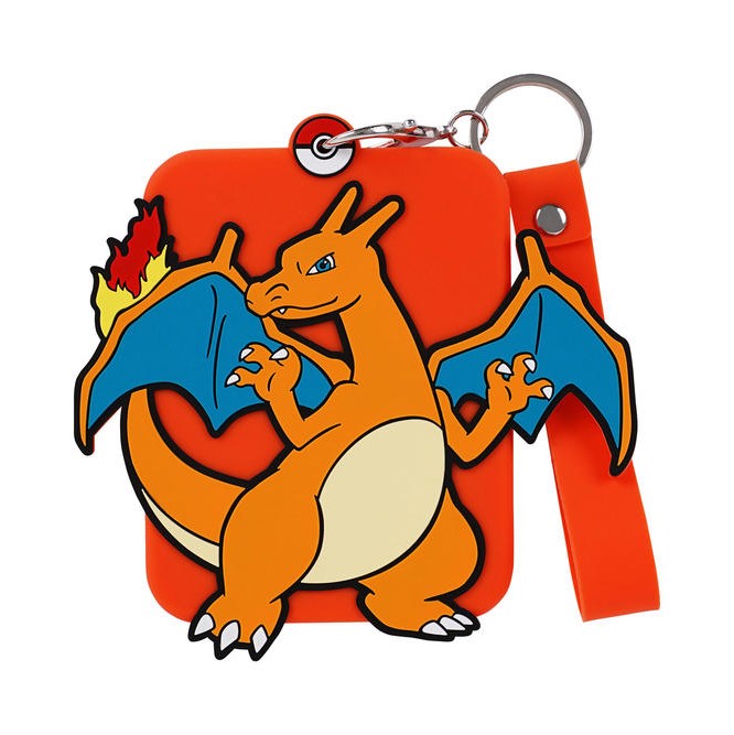 Orange silicone Pokémon display featuring Charizard, with a Poké Ball keychain and wrist strap.