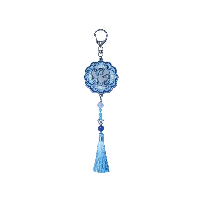 Lugia Pokémon keychain in celadon blue with traditional Korean patterns, decorative beads, and a matching tassel.