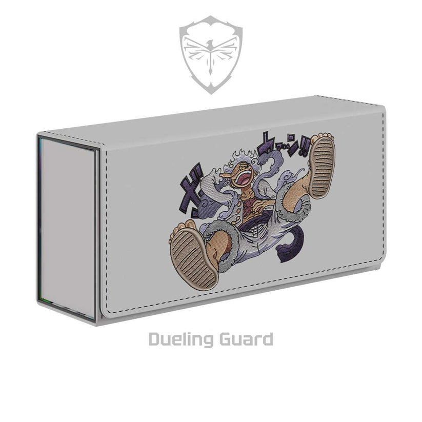 Light gray vegan leather deck box featuring a detailed Sun God Luffy embroidery and magnetic closure.