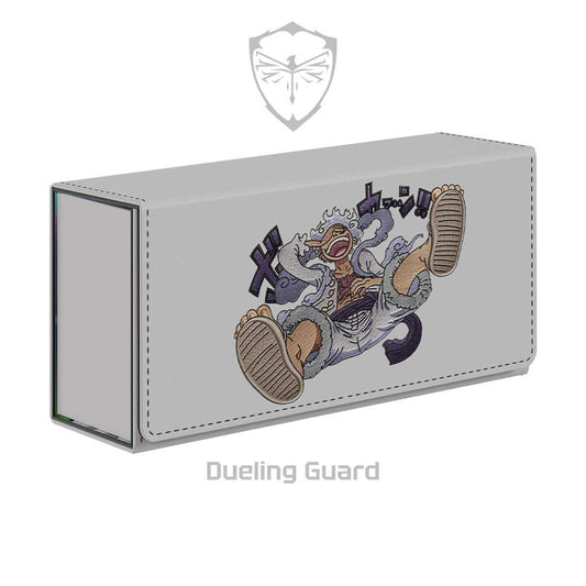 Light gray vegan leather deck box featuring a detailed Sun God Luffy embroidery and magnetic closure.