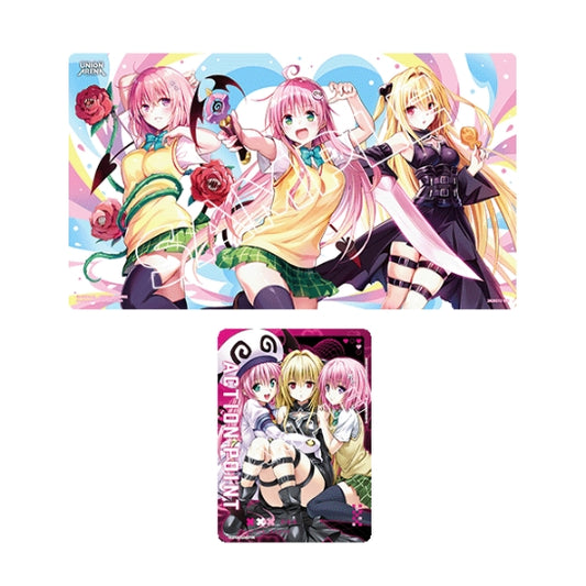 Union Arena To Love Ru playmat and three Action Point cards featuring colorful anime character illustrations on rubber fabric.