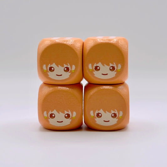 Four 16mm orange wooden TCG dice with rounded corners and a custom anime-style character face engraved on the one side.